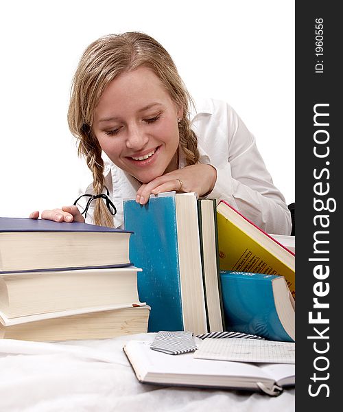 Schoolgirl or student looking at books, separate on white