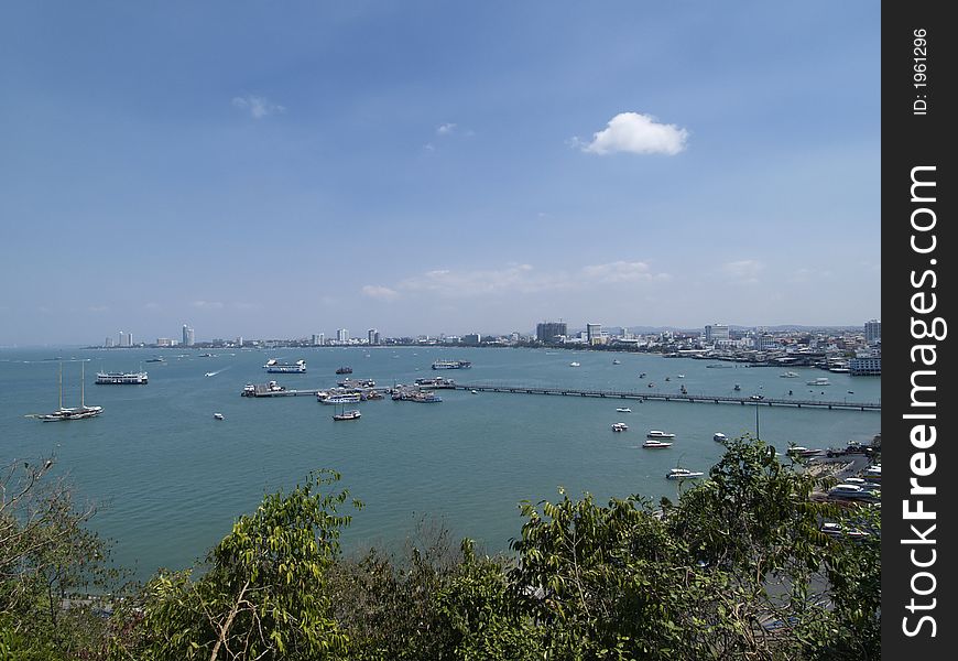 Pattaya City, the resort town in Chonburi province, Thailand, with the bay in the foreground. Pattaya City, the resort town in Chonburi province, Thailand, with the bay in the foreground