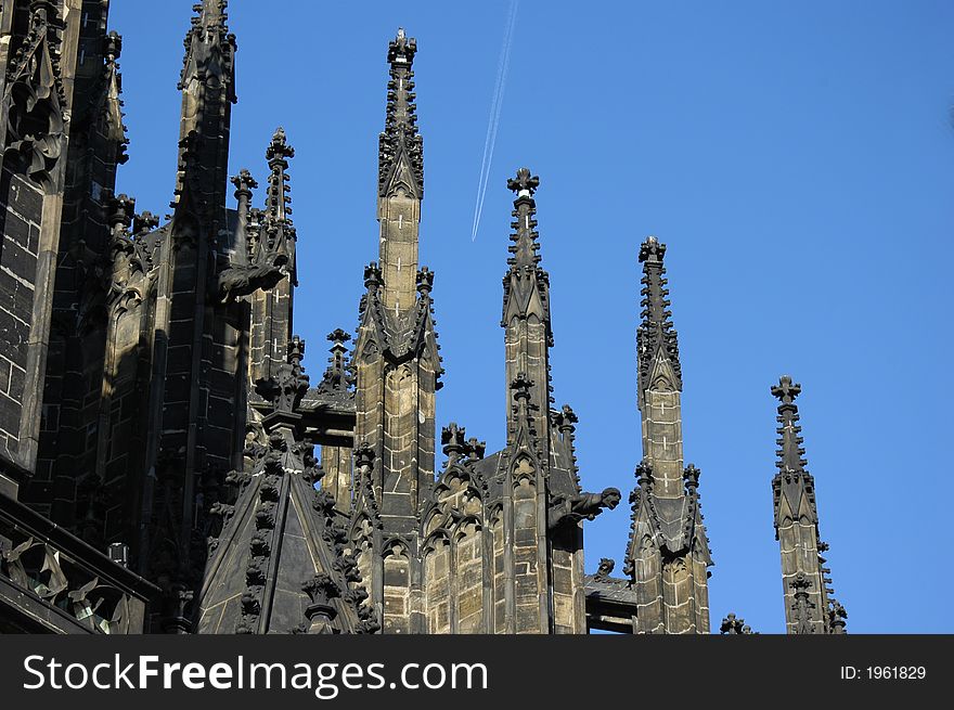 St. Vitus cathedral details with flying plane.Prague, Czech Republic