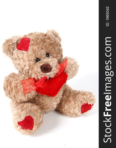 Brown Teddy Bear with hearts on white background. Brown Teddy Bear with hearts on white background