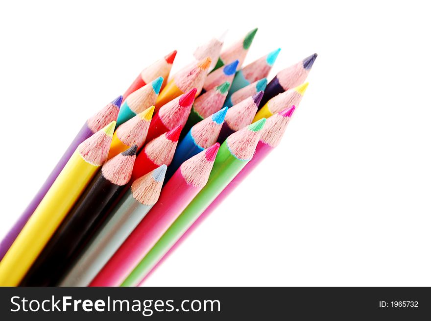 Bundle of multi colored pencils on a white background. Bundle of multi colored pencils on a white background