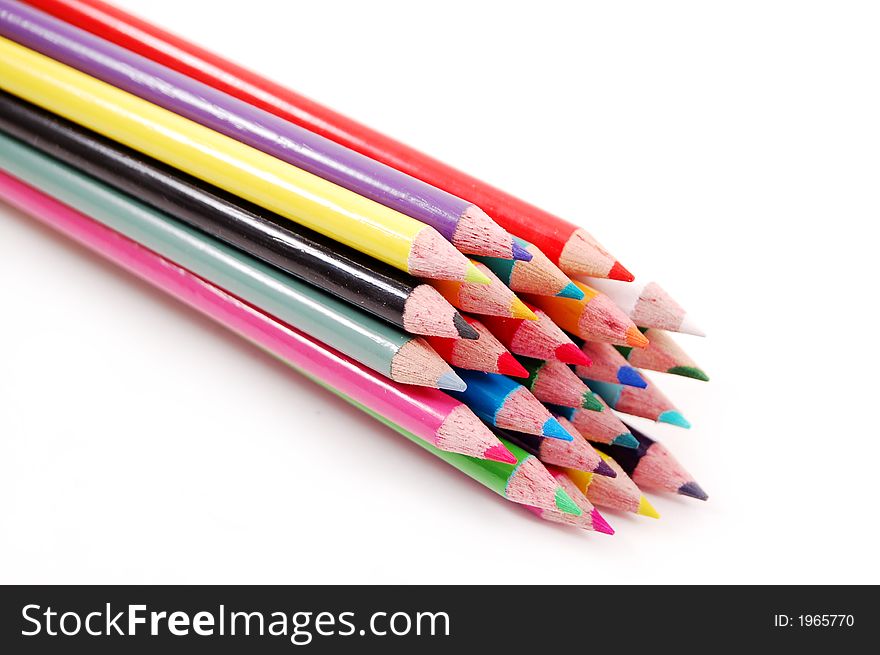 Bundle of multi colored pencils on a white background. Bundle of multi colored pencils on a white background