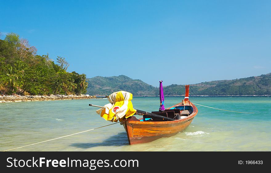 Lonely boat  is waiting for itâ€™s biggest cruise in the shallow water