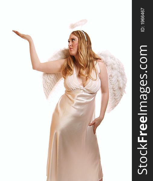 Isolated goddess angel with wing looking to side and holding up her hand. with copyspace on her hand. Isolated goddess angel with wing looking to side and holding up her hand. with copyspace on her hand