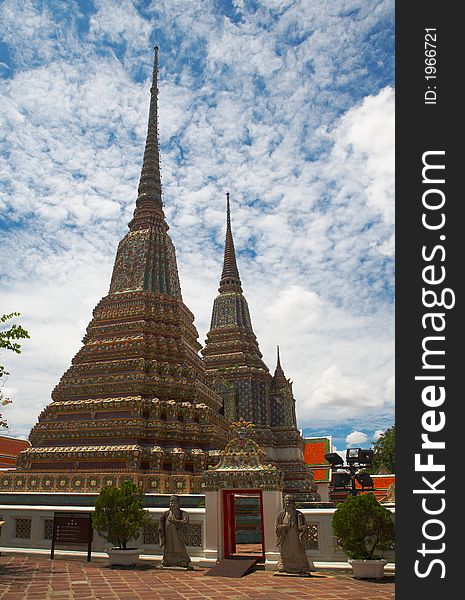 View of nice colorful triple pagoda in thai wat in Bangkok. View of nice colorful triple pagoda in thai wat in Bangkok