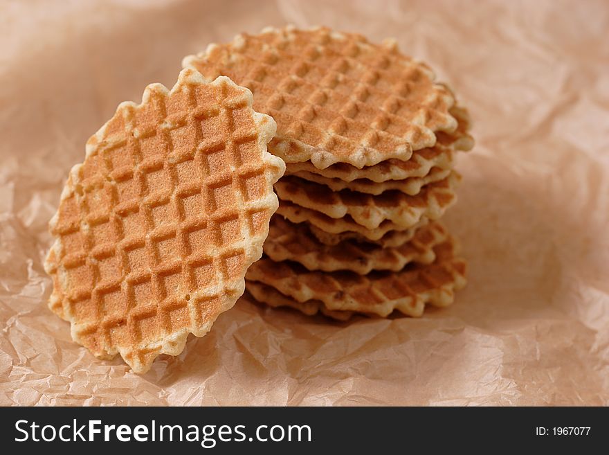 Home made waffles on brown background