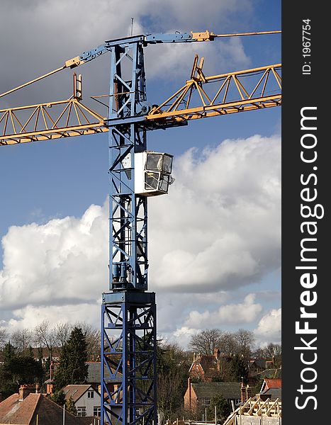 Crane on a Building Site Constructing an Apartment Block. Crane on a Building Site Constructing an Apartment Block