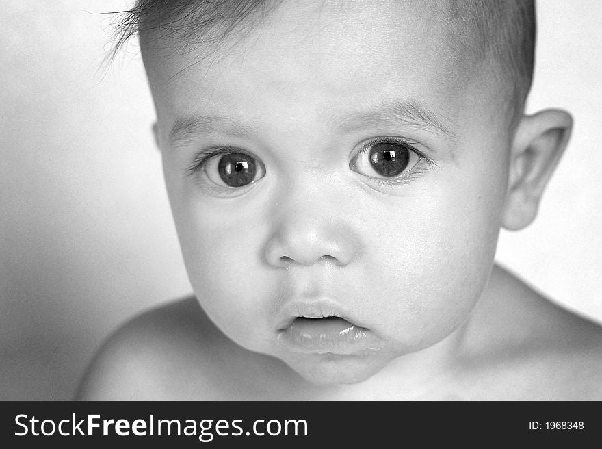 Black and white portrait of beautiful baby