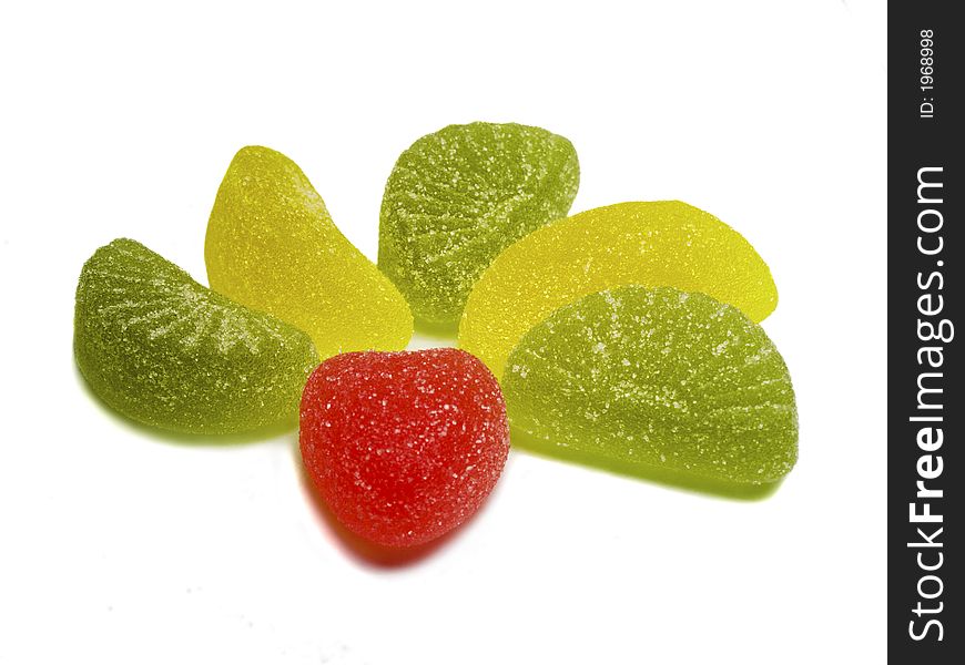 Close-up red green and yellow sweets isolated on white. Close-up red green and yellow sweets isolated on white