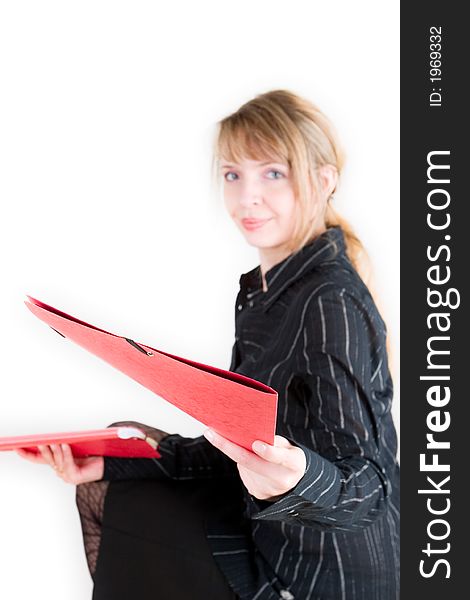A Red Folder And A Blond Woman