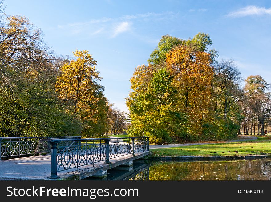 Bridge in the Nymphenburg autumn park in Munich, Germany. Bridge in the Nymphenburg autumn park in Munich, Germany