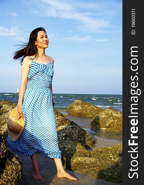 Portrait of young woman on the beach