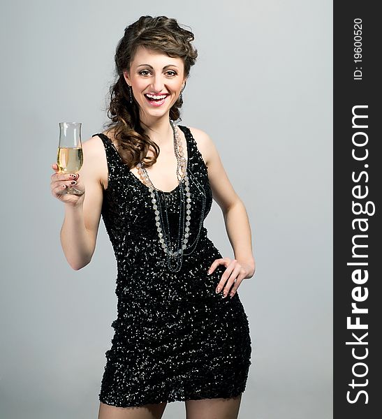 Smiling brunette with a glass of wine