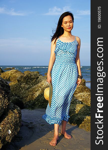 Portrait of young woman on the beach