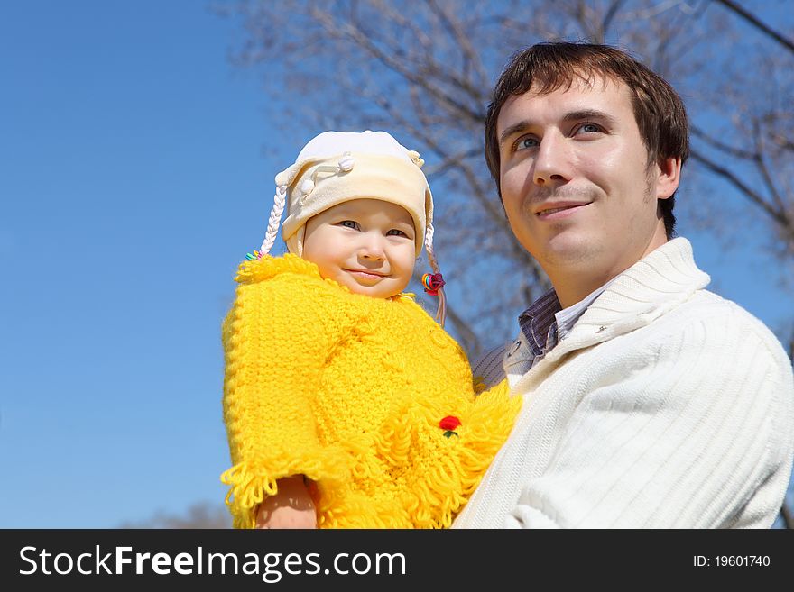 Little Girl With Father In Spring Park