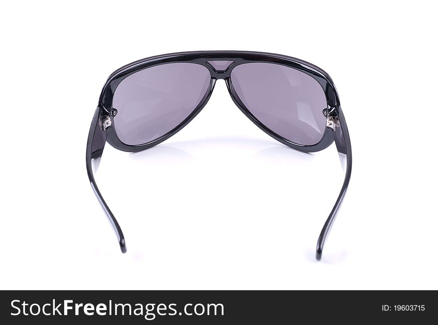 Sunglasses with black frame on white background
