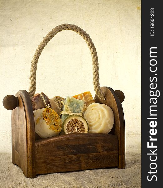 Composition of the basket full of handmade soap.