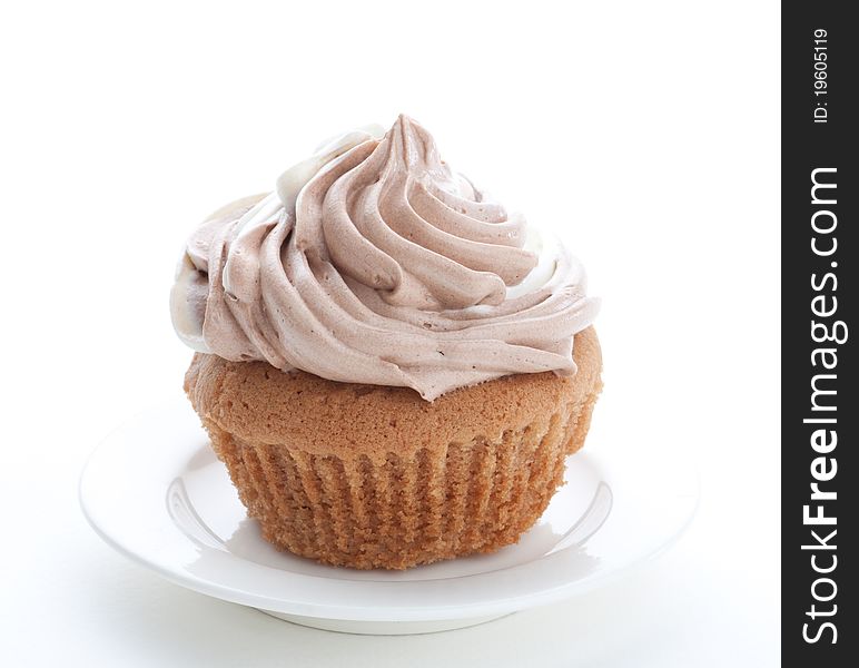 Cupcake with mousse cream isolated