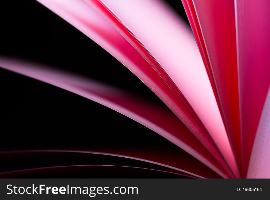 Red glowing notepad paper illuminated by LED lights from bottom in landscape orientation. Red glowing notepad paper illuminated by LED lights from bottom in landscape orientation