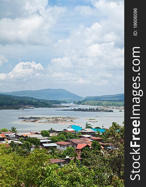 Small Village beside the River and blue sky