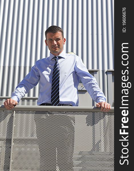 Portrait of young businessman outdoor