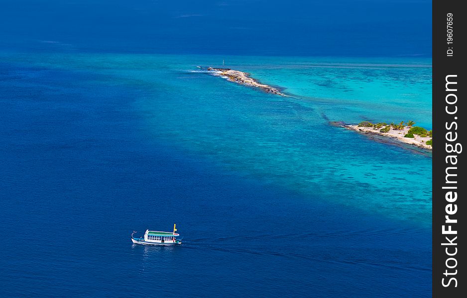 Tropical island at Maldives - aerial view