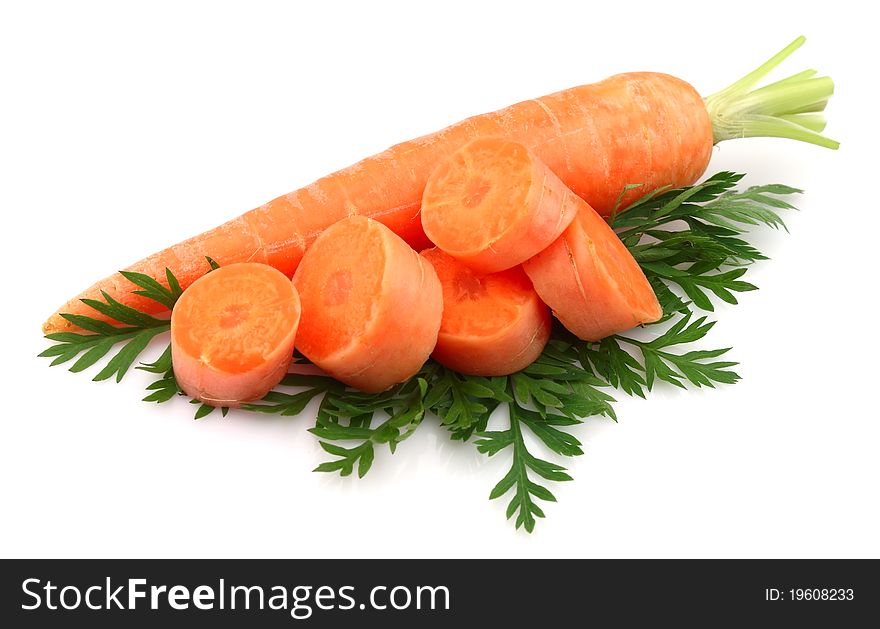 Young carrots with leaves on a white background