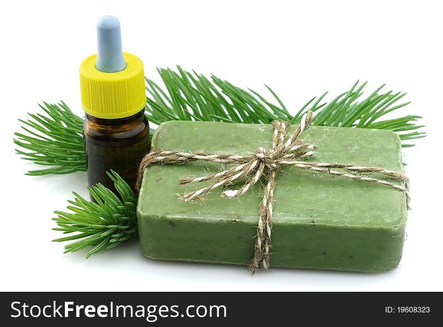 Branches of needles with soap and an essential oil. Branches of needles with soap and an essential oil