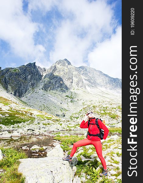 Woman backpacker at Five Spis Tarns, Vysoke Tatry (High Tatras), Slovakia