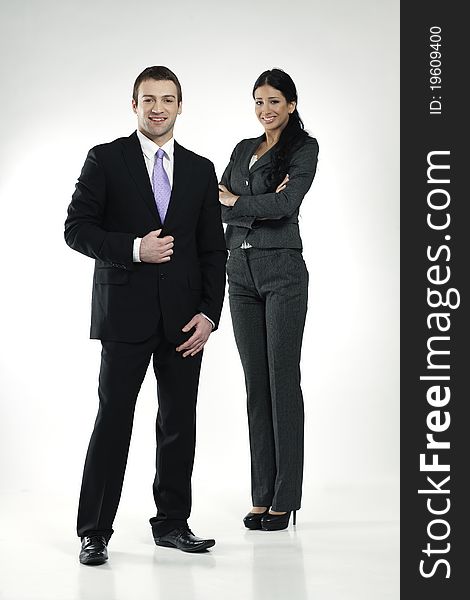 Smiling confident businessman and businesswoman. Smiling confident businessman and businesswoman