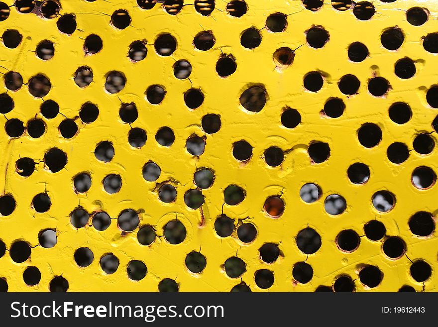 Holes on  metal plate