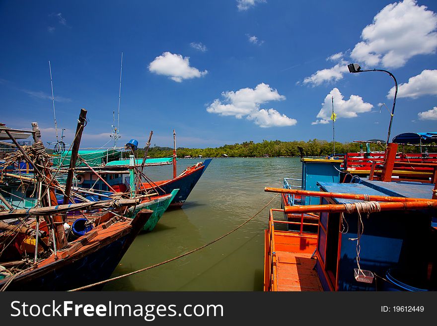 Scene of fishing boats at a port in Thailand