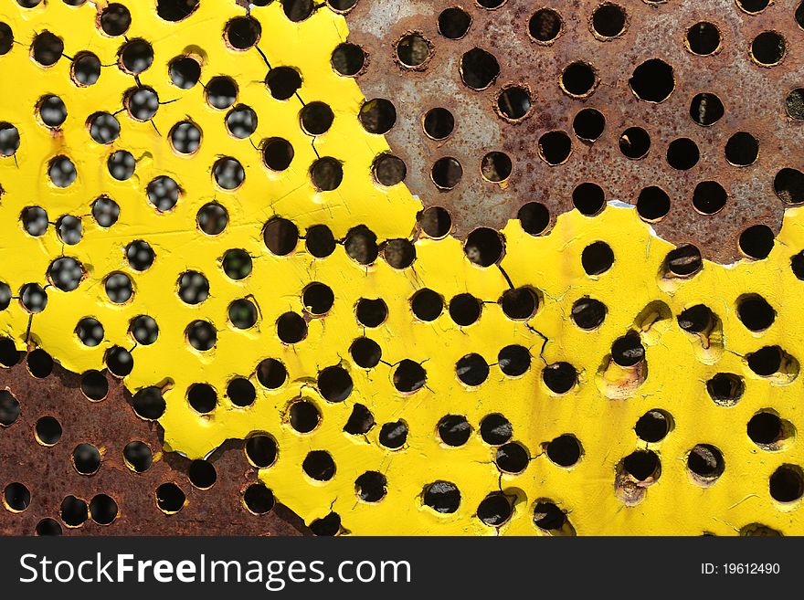 Hole and rust on  metal plate