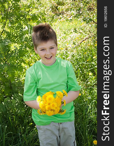 A Boy With A  Dandelions