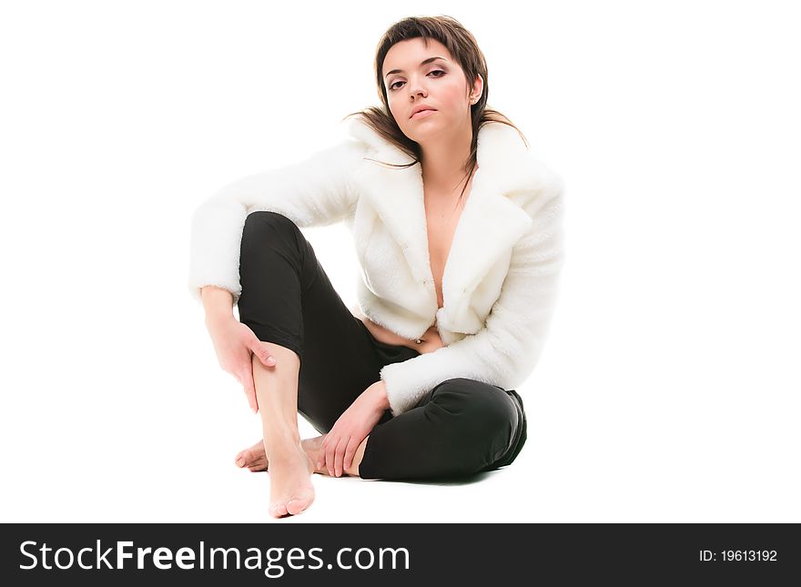 Cute young girl in a short white coat. Cute young girl in a short white coat