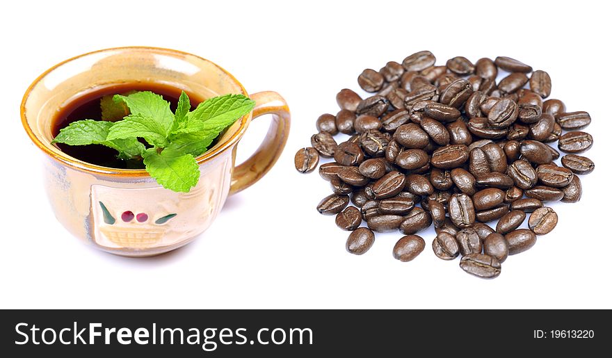 Black cofee with beans isolated on white background. Black cofee with beans isolated on white background.