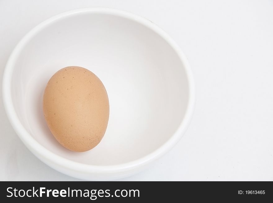 Egg in cup as isolate background