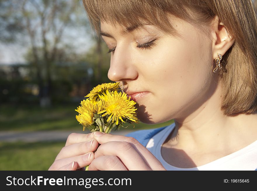 Girl And Dandelions