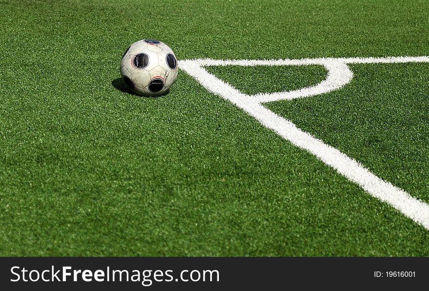 A soccer ball in stadium, corner- selective focus. A soccer ball in stadium, corner- selective focus