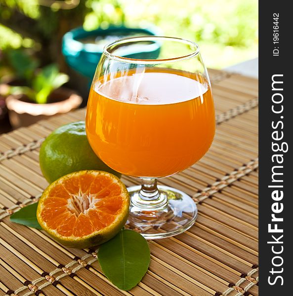 Glasses of orange juice and fruits, high vitamin C