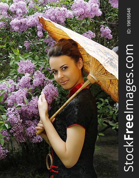 Asian Style Woman In Lilac