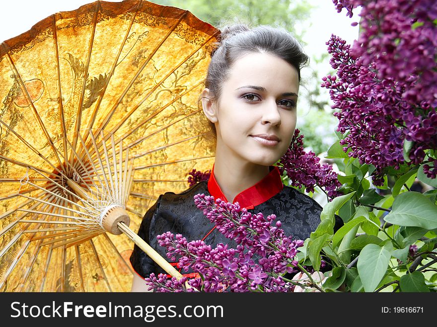 Portrait of an asian style woman in lilac