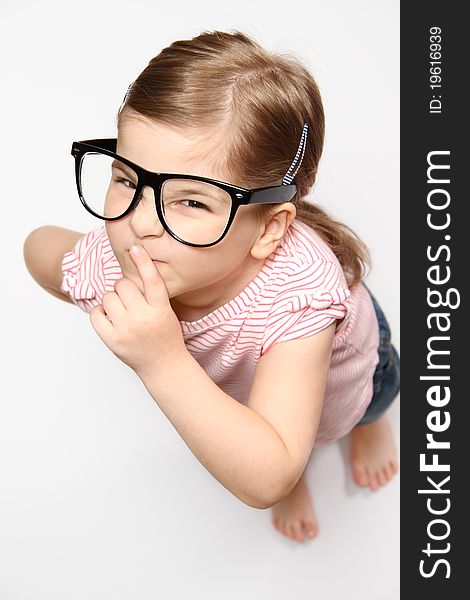 Portrait of lovely smiling girl in glasses