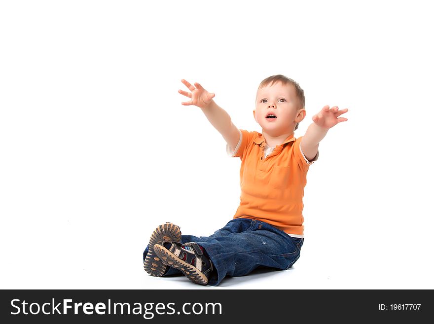 Cute little beautiful boy sitting on floor and hold arms hands to hug, isolated on white background. concept. Cute little beautiful boy sitting on floor and hold arms hands to hug, isolated on white background. concept.