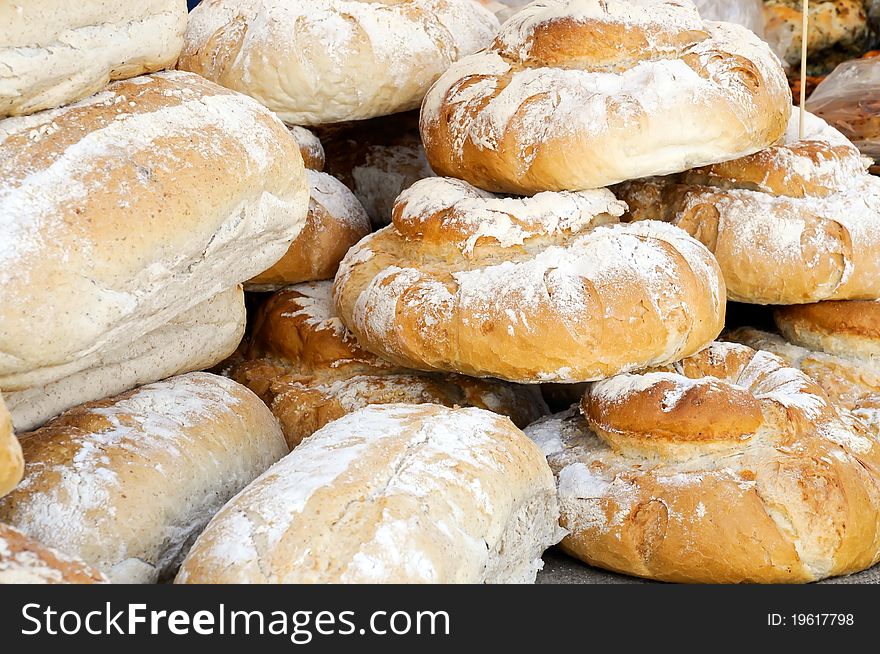 Freshly cooked crusty bread on sale at a market in England. Freshly cooked crusty bread on sale at a market in England.