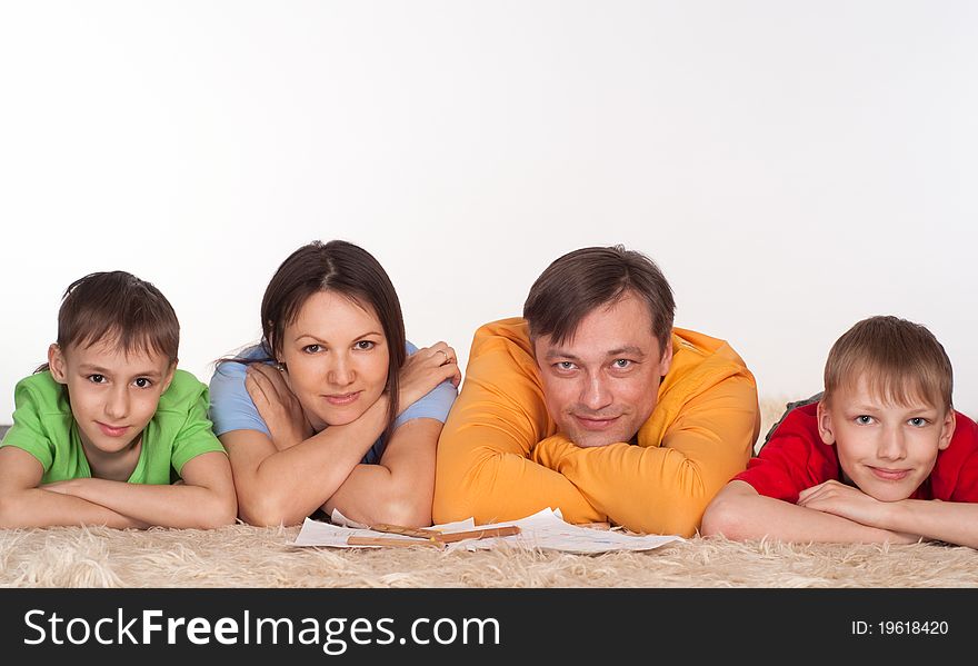 Portrait of a wonderful family on a white