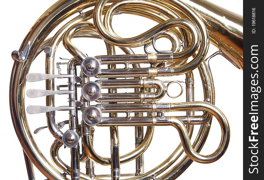 A concert french horn set against a white background. A concert french horn set against a white background