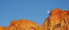 Moon Over Red Rock Royalty Free Stock Photography