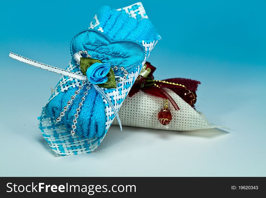 Two door gifts isolated on blue background. Two door gifts isolated on blue background
