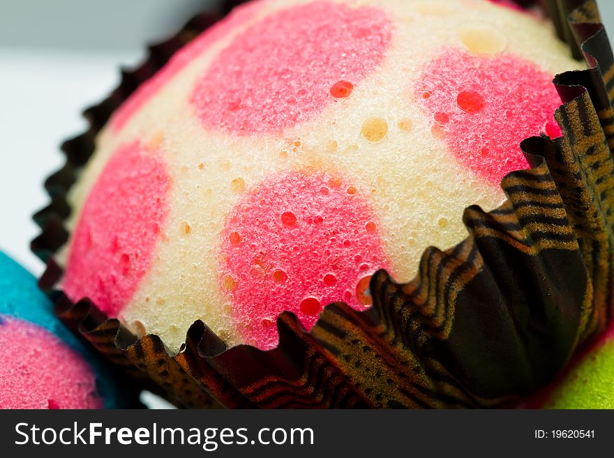 Close up view of the delicious colorful cup cakes. Close up view of the delicious colorful cup cakes